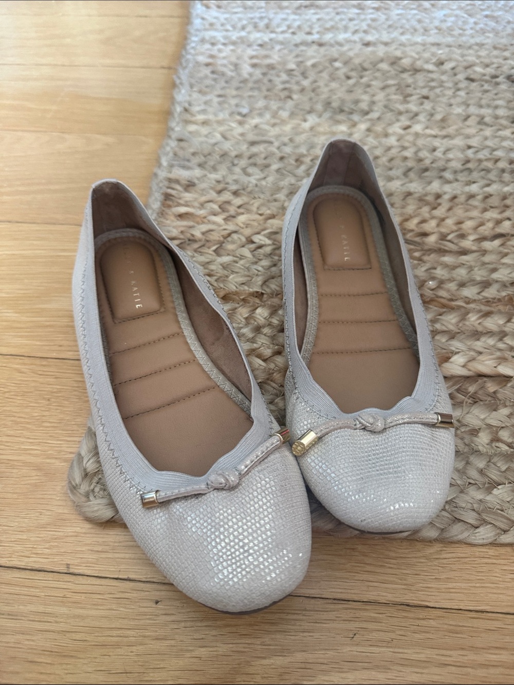 Kelly & Katie Light Beige Textured Ballet Flats with Gold Bow Tips